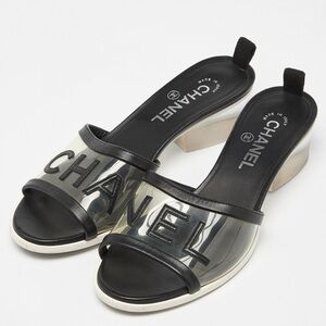 CHANEL Black and Clear Mules